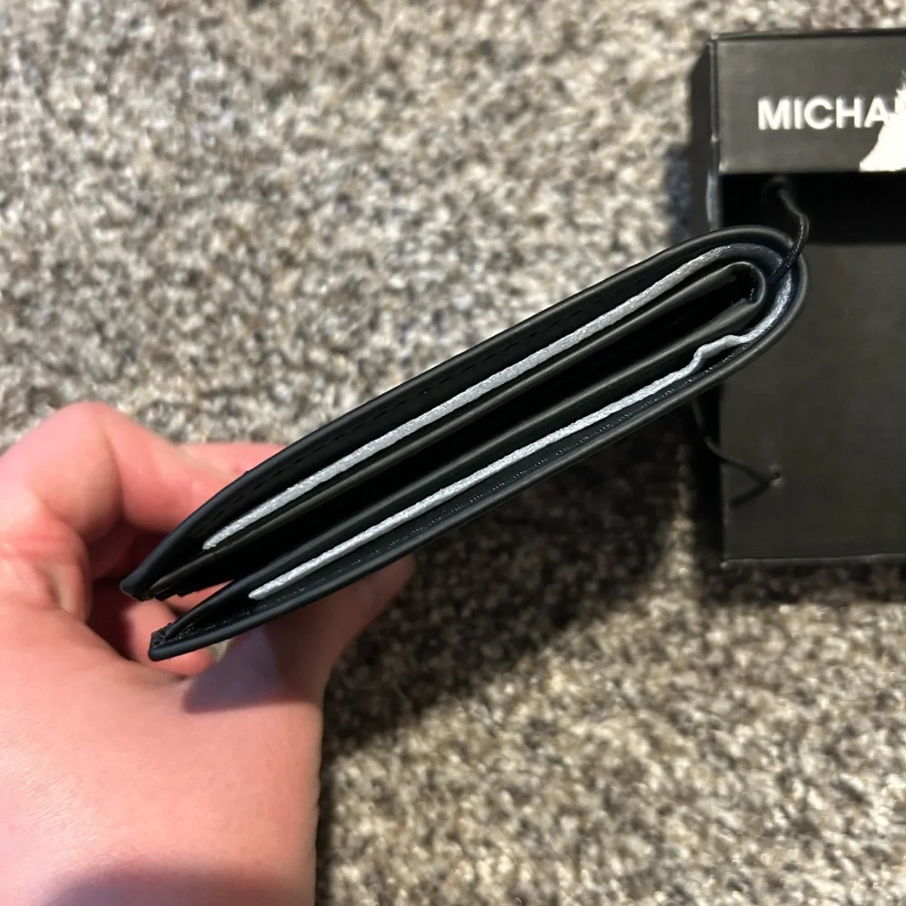Michael Kors Men’s Black Leather Bifold
